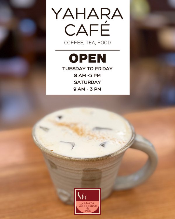 Yahara Cafe advertisement with a coffee cup on a wooden table